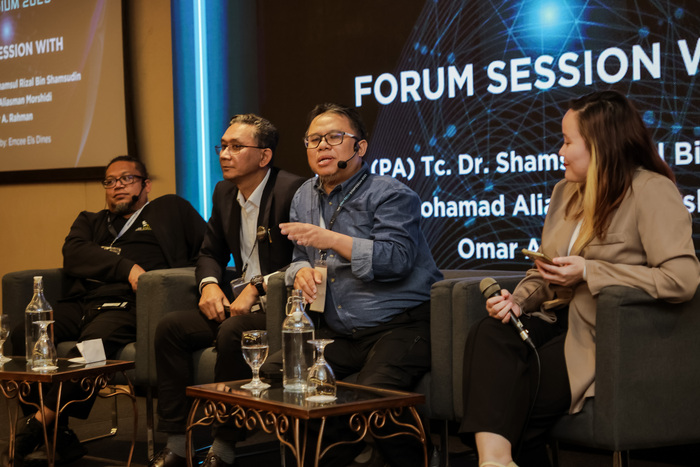 Omar, seated at the far left, taking part in the 1st OSH Tech Symposium 2025 panel